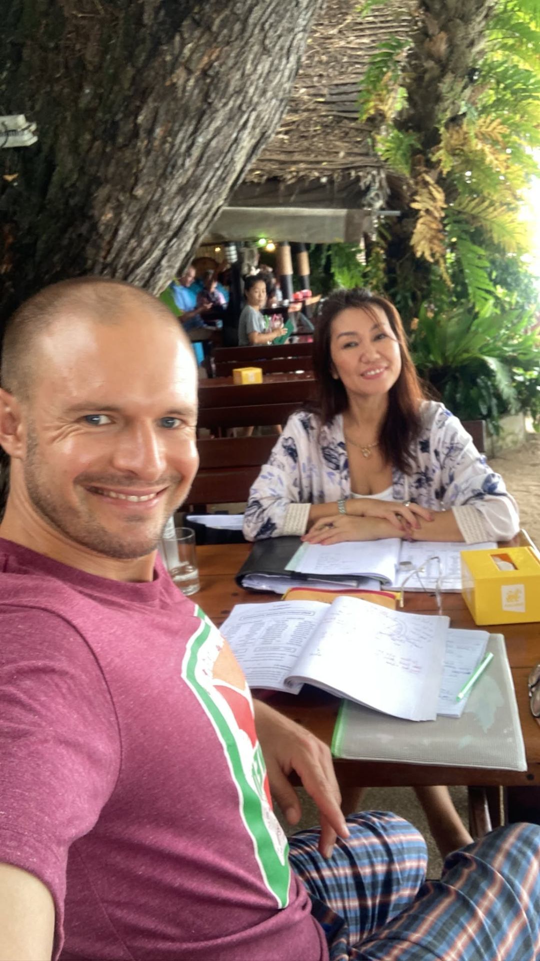 Rita teaching a student in a relaxed outdoor lesson in Phuket